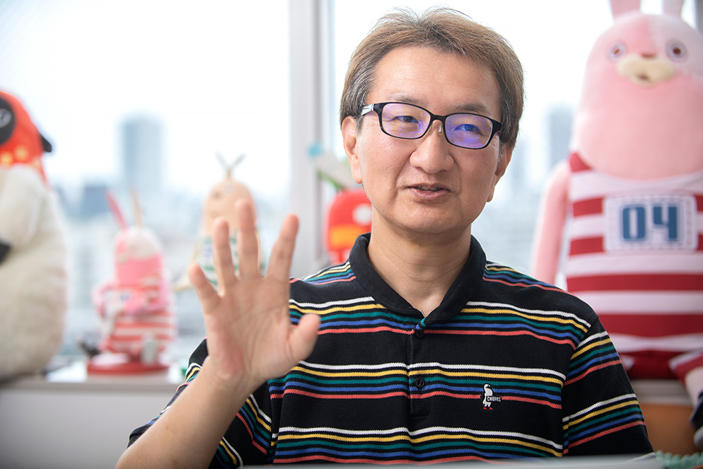 富岡 聡 氏