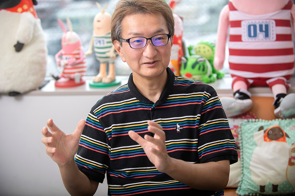 富岡 聡 氏